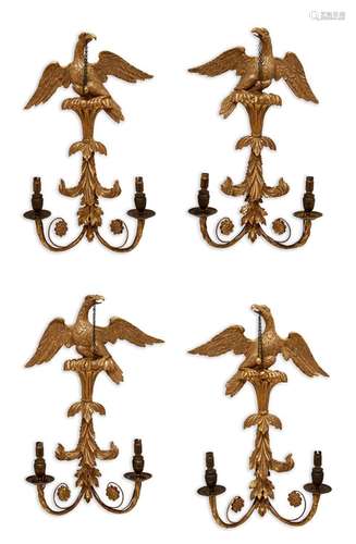 A set of four giltwood twin-light wall appliques, one pair c...