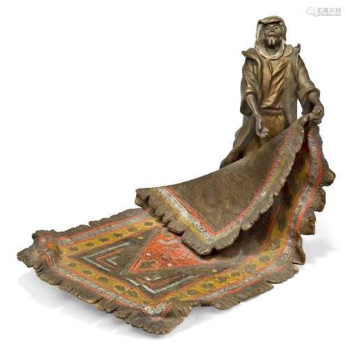 An Austrian cold-painted bronze model of a carpet seller, Be...