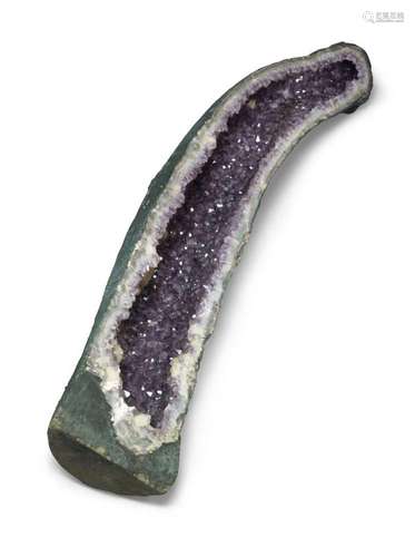 A large amethyst and quartz 'cathedral' geode spec...