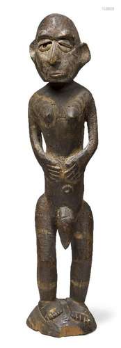 A Sepik river region carved figure, New Guinea, 20th century...