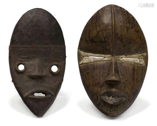 A Dan mask, Ivory Coast, 20th century, of oval form with sty...