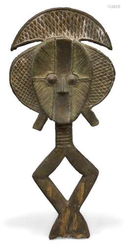 A Bakota double face reliquary figure, Gabon, 20th century, ...