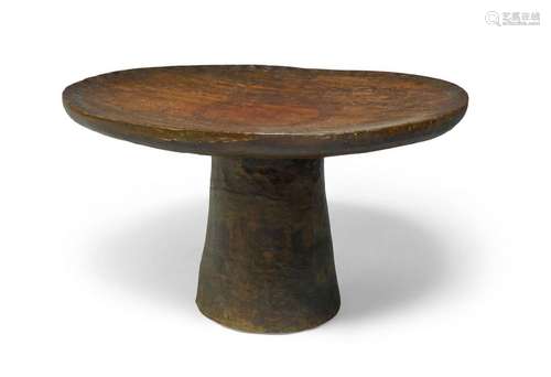 A Senufo low table, Ivory Coast, 20th century, the circular ...