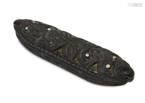 A MÄori waka huia/feather box and cover, of canoe form carv...