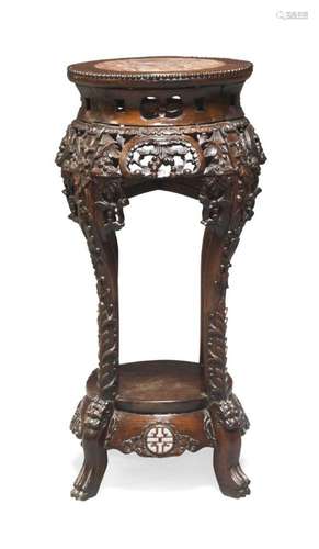 A Chinese hardwood and marble top jardiniere stand, 19th cen...