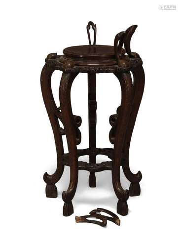 A Chinese hardwood carved jardiniere stand, probably 19th ce...