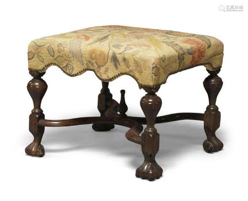 A George I walnut joined stool, woolwork upholstered seat, r...