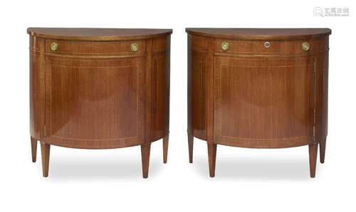 A pair of George III style mahogany demi-lune side cabinets,...