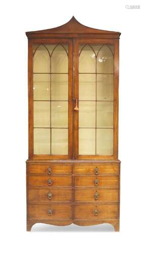 A George III mahogany bookcase on chest, c.1810, the upper s...