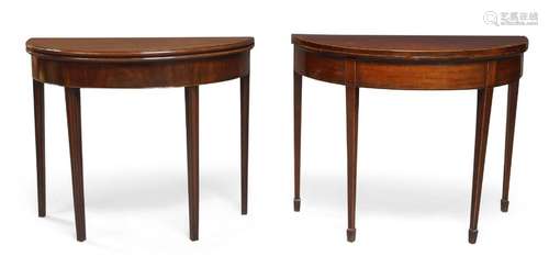 Two George III mahogany demi-lune card tables, comprising on...