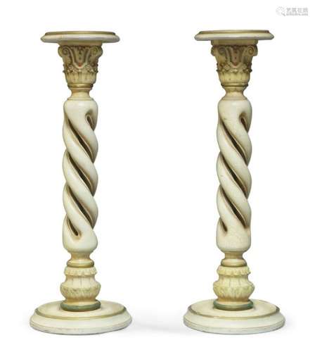 A pair of Classical style wrythen torcheres, of recent manuf...