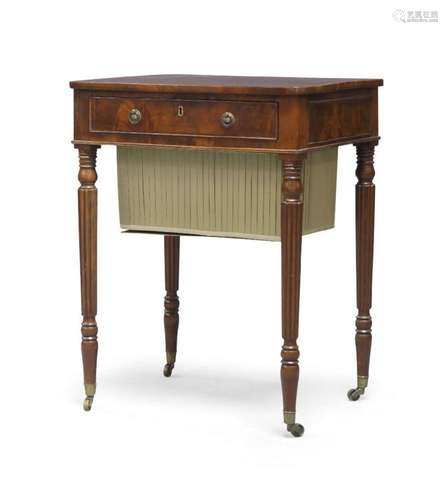 An early Victorian mahogany work table, c.1850, fitted with ...