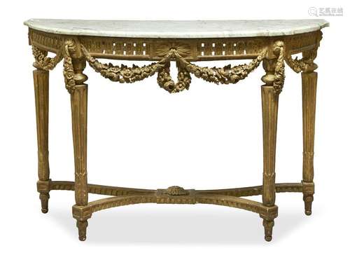 A Louis XVI giltwood console table, with shaped marble top, ...