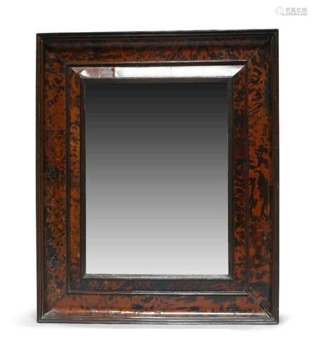 A large tortoiseshell concave wall mirror, late 19th century...