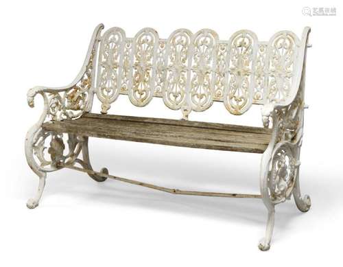 A white-painted cast-iron Coalbrookdale style garden bench, ...