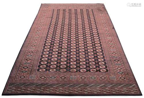 A Turkman carpet, mid to late 20th century, with seven rows ...