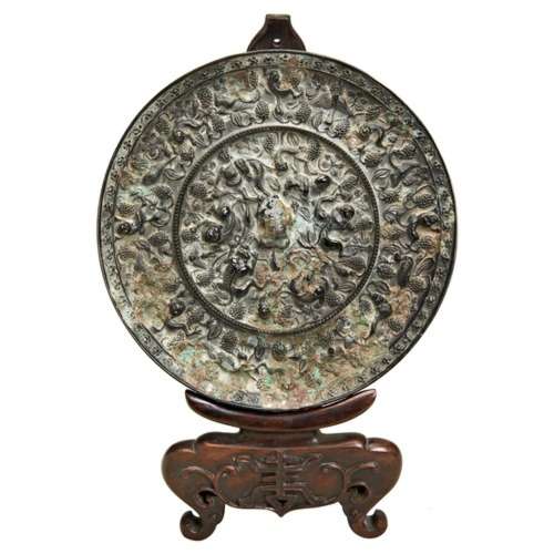 BRONZE MIRROR TANG DYNASTY (AD 618-907) the circular bronze ...