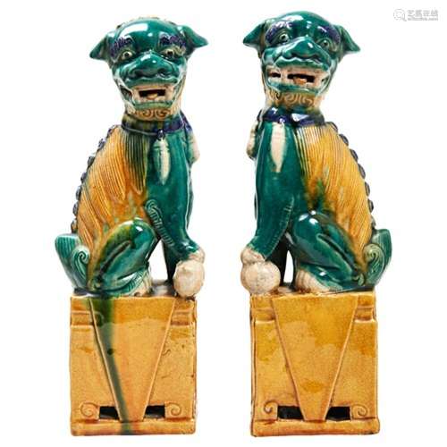 PAIR OF SANCAI-GLAZED BUDDHIST LIONS LATE QING DYNASTY shown...