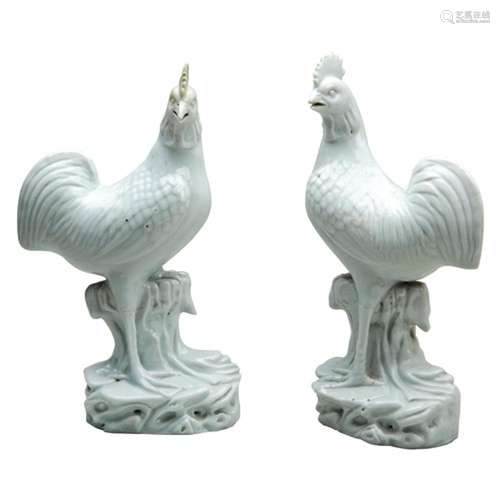 PAIR OF DEHUA COCKERELS QING DYNASTY standing with one leg r...