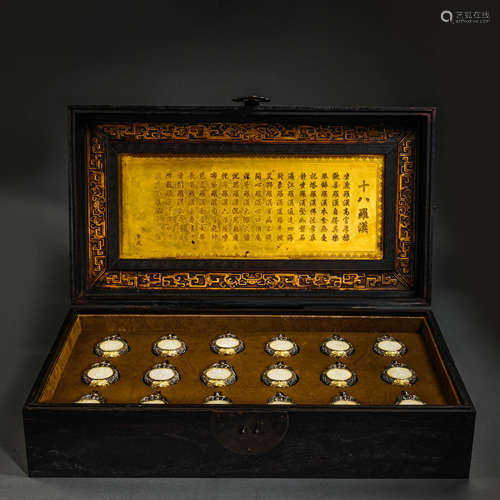 A SET OF SILVER EIGHTEEN ARHATS INLAID HETIAN JADE IN THE PA...