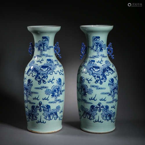 A PAIR OF LARGE BLUE AND WHITE DOUBLE-EARED VASES WITH WHITE...