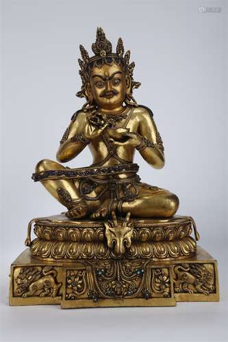 A Gilt Copper Mahasiddha Buddha Statue.