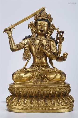 A Gilt Copper Manjusri Bodhisattva Statue.