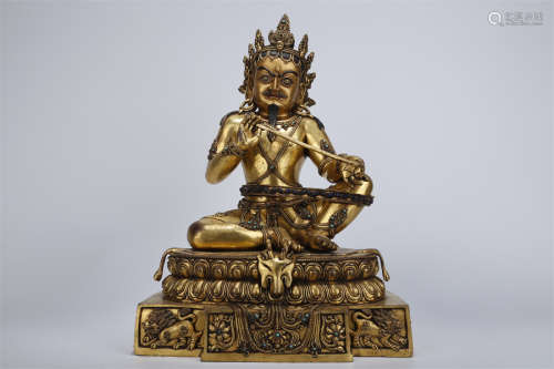 A Gilt Copper Mahasiddha Buddha Statue.