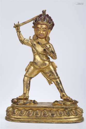 A Gilt Copper Hayagriva Buddha Statue.