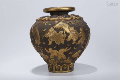 A Copper Jar with Playing Kids Motif.