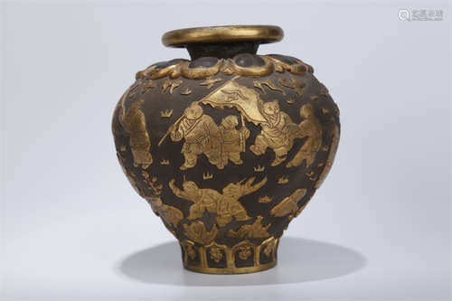 A Copper Jar with Playing Kids Motif.