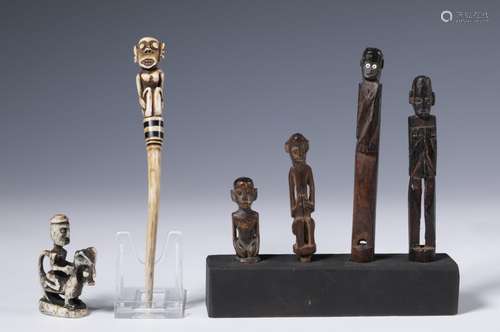 Borneo, East Kalimantan, Dayak, four amulets, a deer horn im...