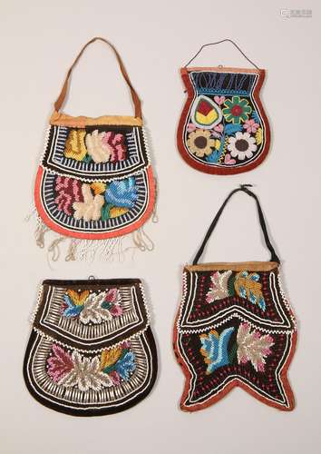 North America, plain Indians, four beaded pouches with flora...