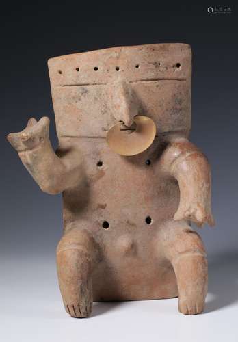 Colombia, a terracotta seated slab figure in Quimbaya style ...