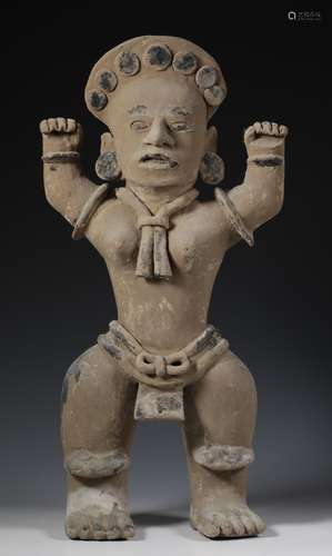 Ecuador, a large standing priest figure in Tunaku style, 20t...