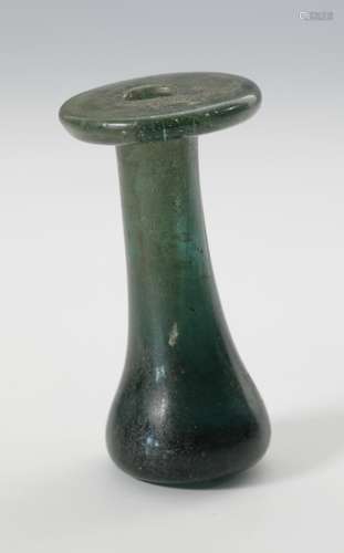 Islamic thick green glass bottle, ca. 12th-15th century.