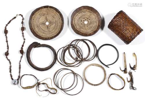 Melanesia, a collection of ornaments, two coconut shell disc...