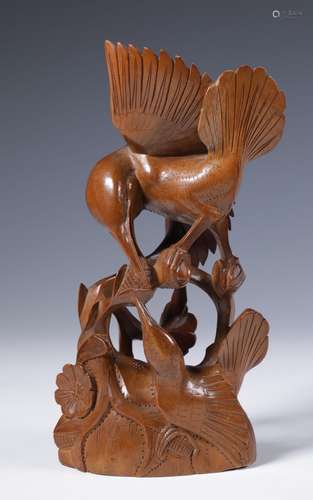 Indonesia, Bali, carved wooden sculpture of a bird.