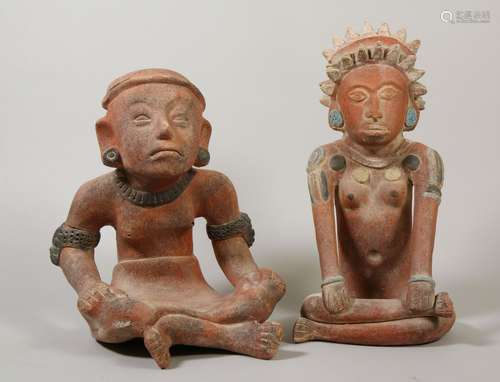 Two decorative Pre-Colombian style terracotta seated figures...