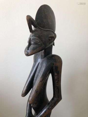 Ivory Coast, Senufo, late period standing female figure,