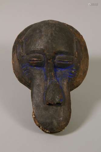 West African wooden baboon mask with teeth and Reckitt's blu...