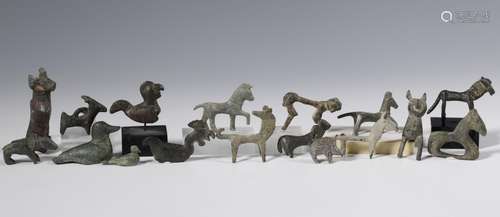 A collection of bronze animal figures of various cultures, s...