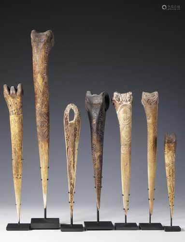 Papua, Abelam, six bone daggers and a bone spatula.