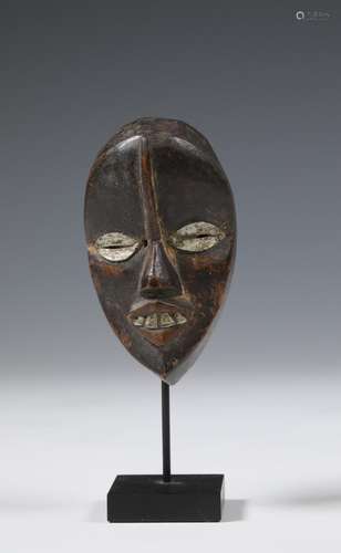 Ivory Coast, Dan, miniature mask with aluminium eyes and tee...