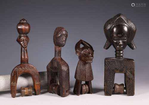 A collection of African wooden objects