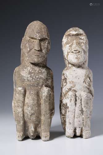 Nusa Tenggara, two lime stone squatting male ancestor figure...