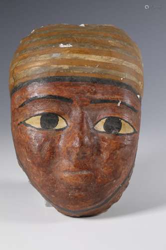 Egypt, a stucco canvas mummy mask, Ptolomeic Period.