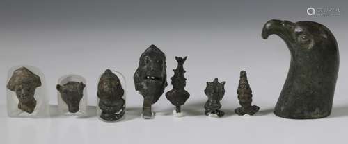 Roman bronze head of a falcon, and a collection of nine Roma...