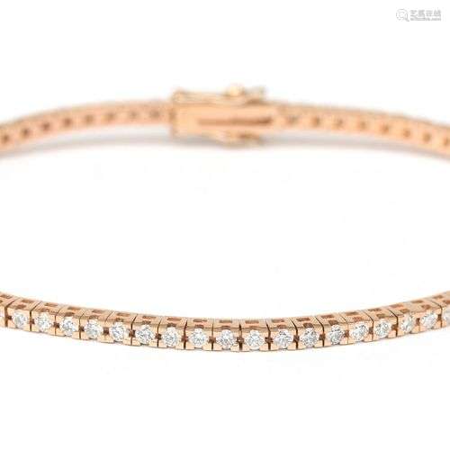 An 18 karat rose gold diamond tennis bracelet. Featuring eig...