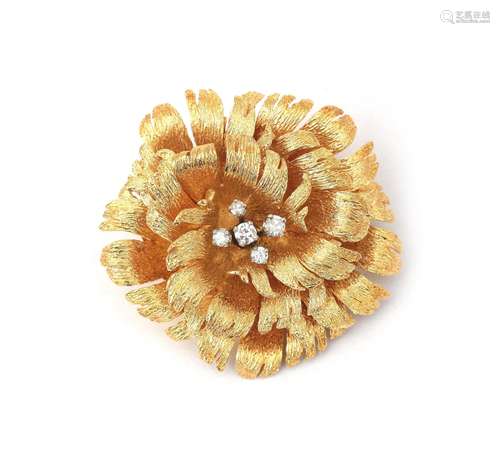 An 18 karat gold diamond flower brooch. Featuring five diamo...